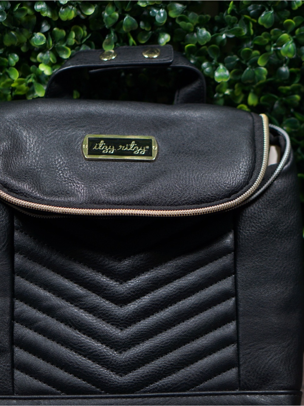 Itzy Ritzy Black Quilted Logo Plaque Handbag